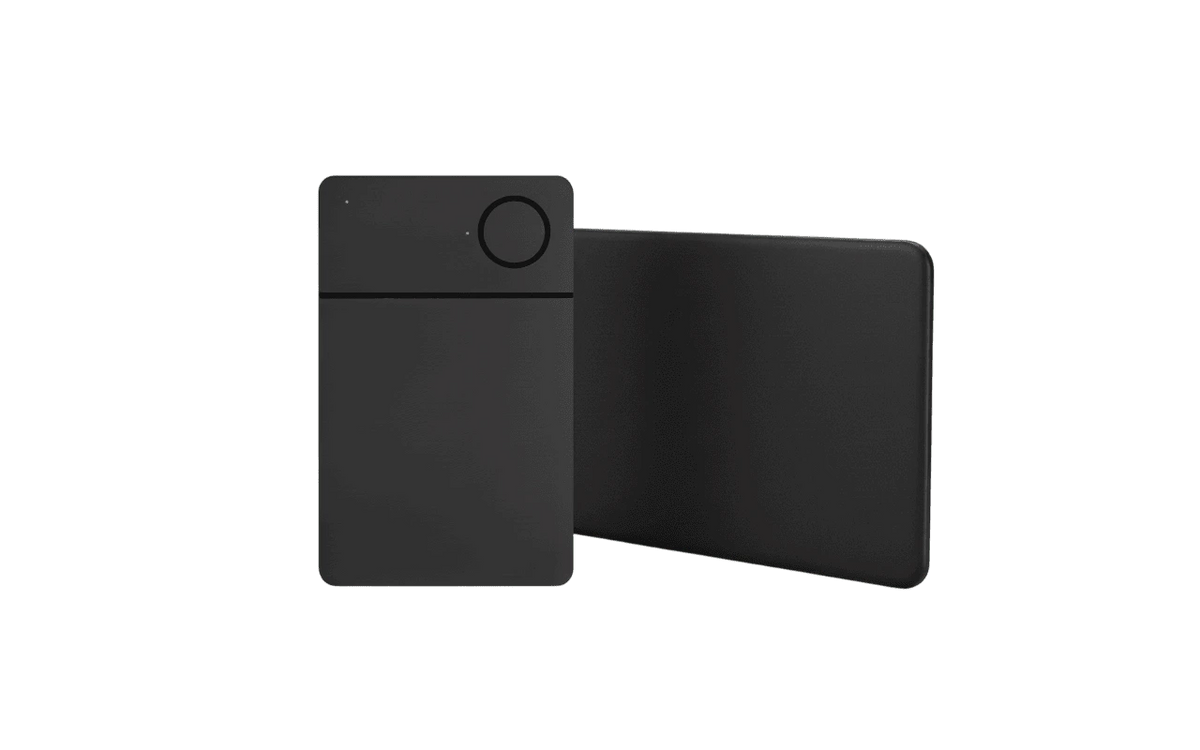 A sleek, black, minimalist tracking card is displayed against a black background. It has a rectangular shape with a circular button, conveying modern elegance.